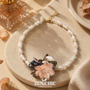 Pulsera de perlas naturales con flor rosa